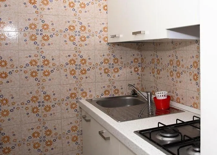 Two Storey Terraced House In A With A Pool *